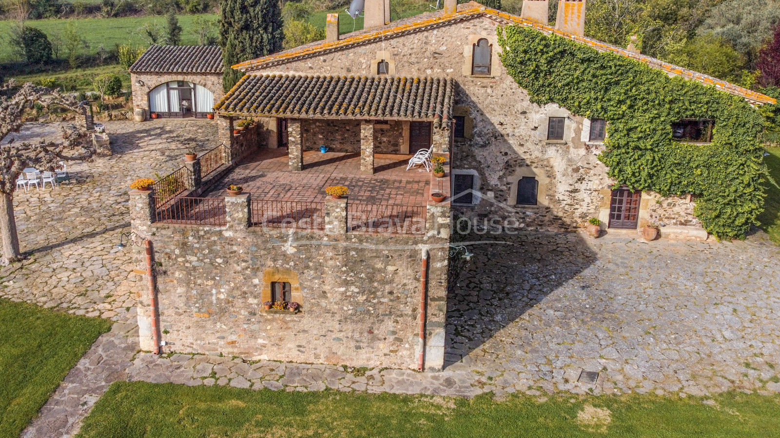 Stately 17th century Catalan country house for sale in Cruilles with 19 ha of land and outbuildings