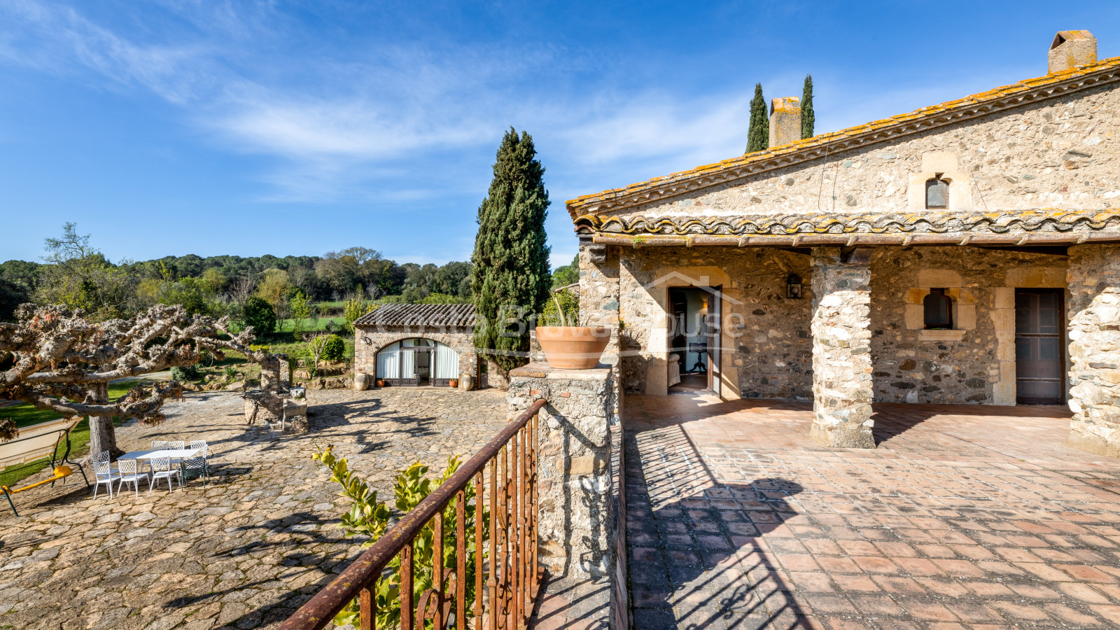 Stately 17th century Catalan country house for sale in Cruilles with 19 ha of land and outbuildings