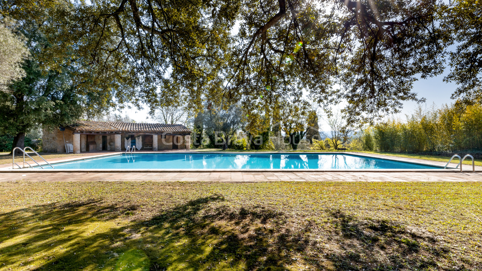 Stately 17th century Catalan country house for sale in Cruilles with 19 ha of land and outbuildings