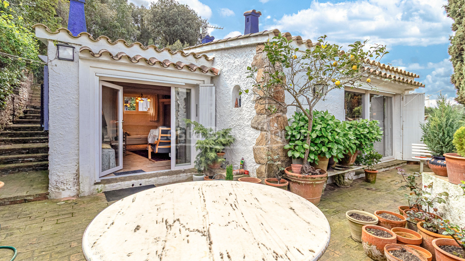 Casa de poble amb jardí i llicència a Begur Centre