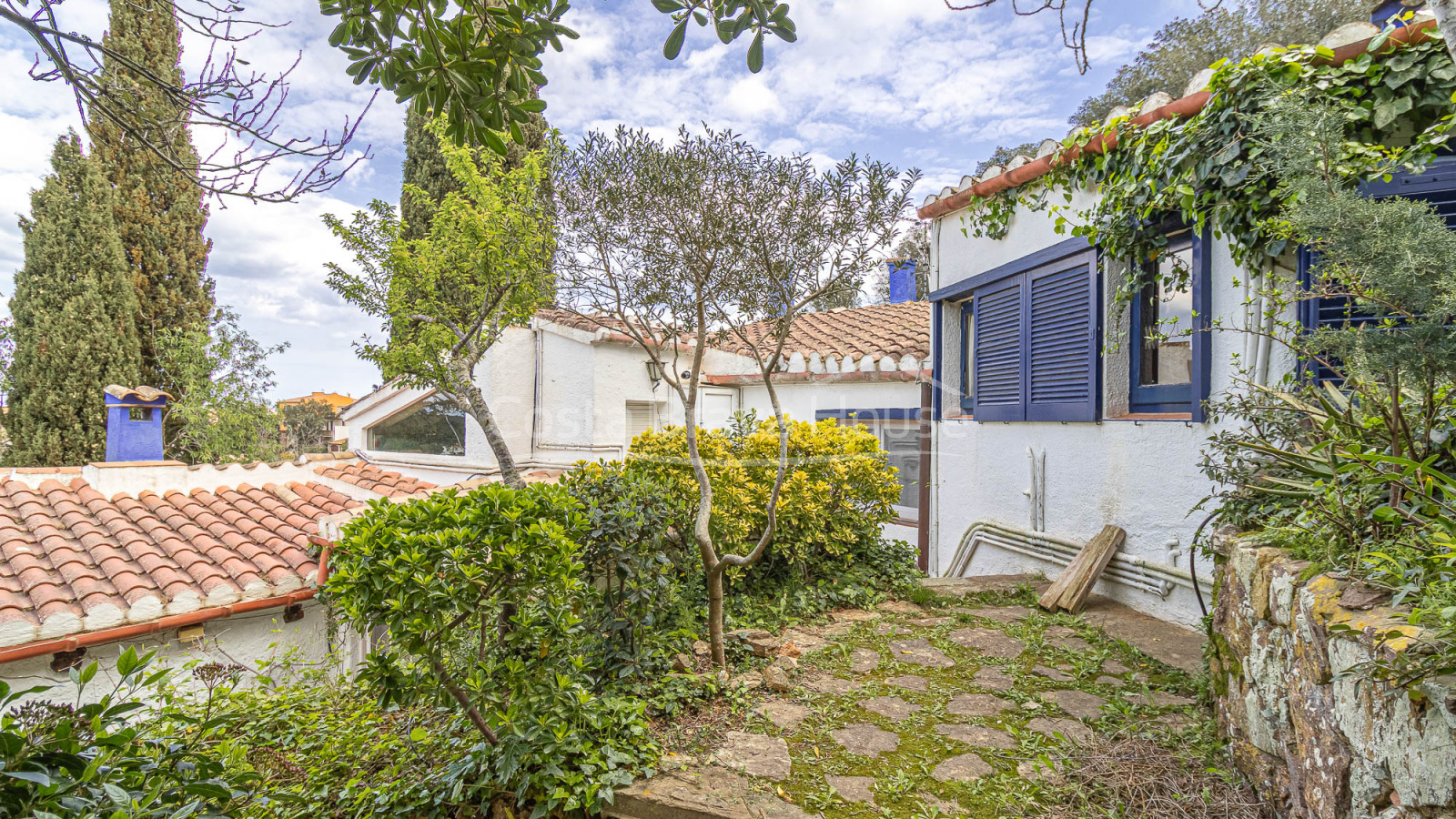 Casa de poble amb jardí i llicència a Begur Centre