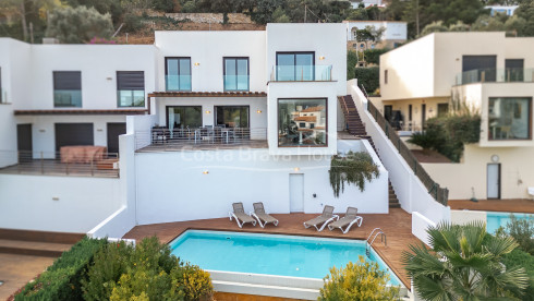 Contemporary house in Sa Riera with sea views, stepped terraces and private pool