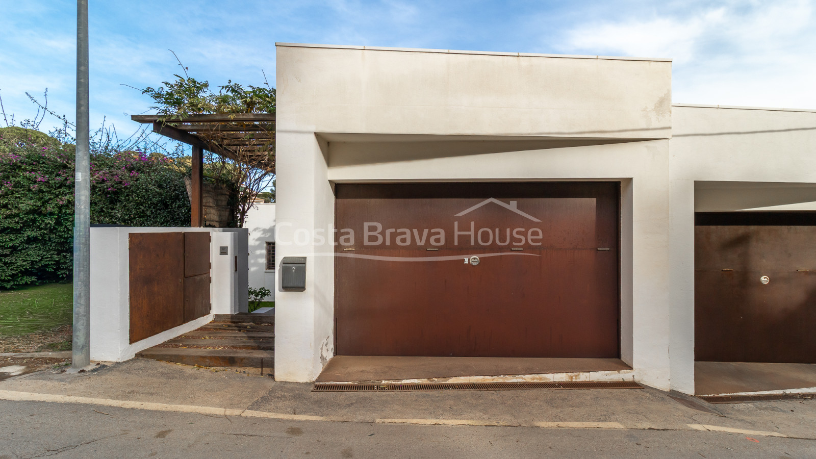 Contemporary house in Sa Riera with sea views, stepped terraces and private pool